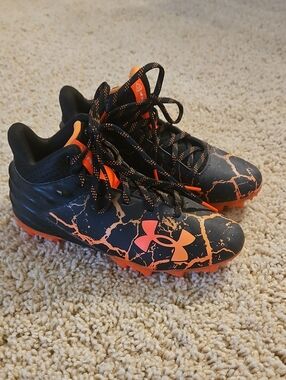 Under Armour Kids Black and Orange Fire Cleats